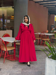 Elegant reddish maroon maxi dress by Yezwe with ruffled sleeves and a flowing skirt