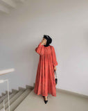 Yezwe Small Floral Modest Dress in Coral with Long Sleeves and Flowing Skirt