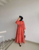 Yezwe Small Floral Modest Dress in Coral with Long Sleeves and Flowing Skirt