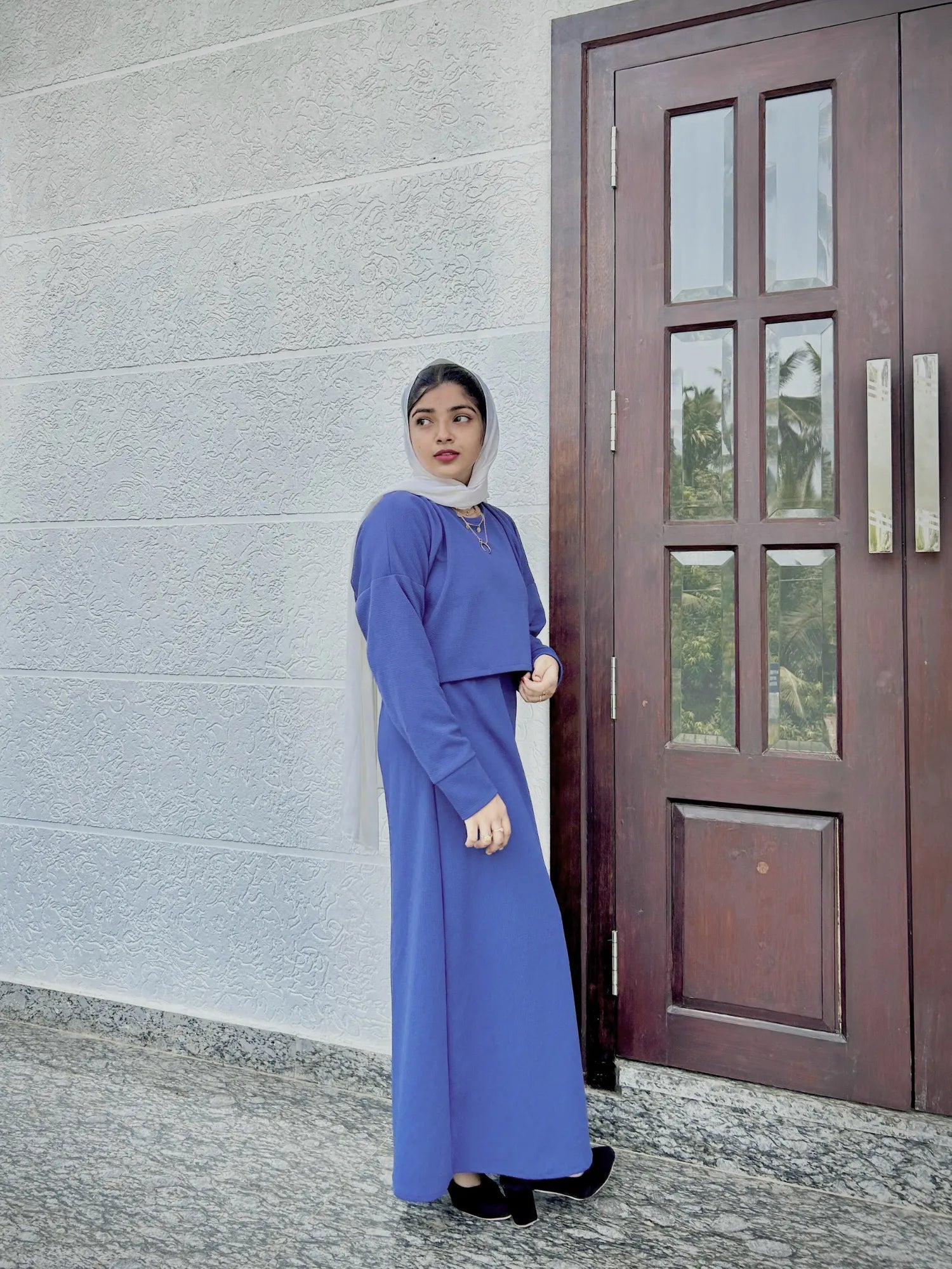 Yezwe Turkish style modest wear featuring a chic blue top and flowing skirt for elegant outfits