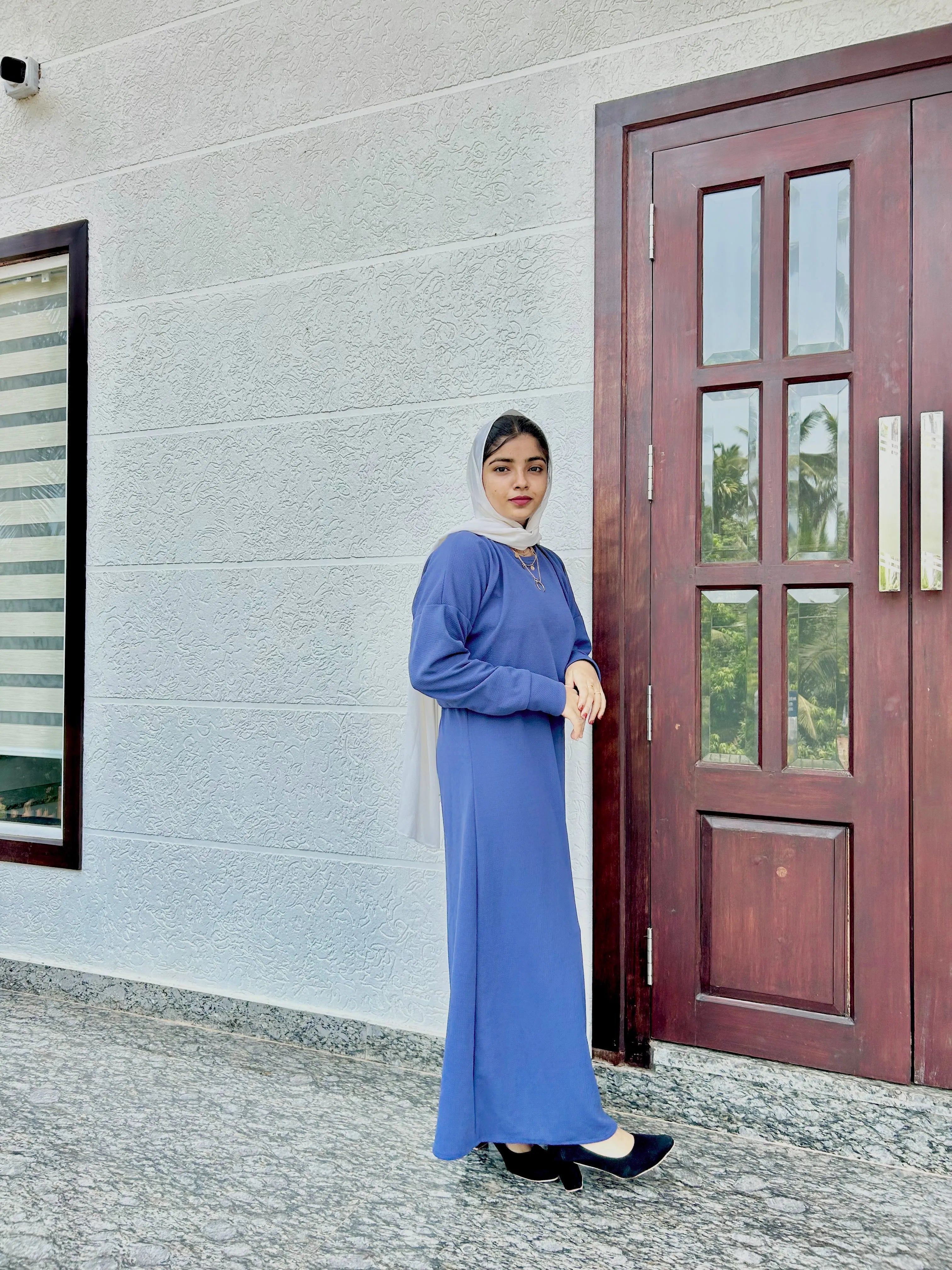 Elegant blue Turkish style modest wear set featuring a top and skirt with a stylish design
