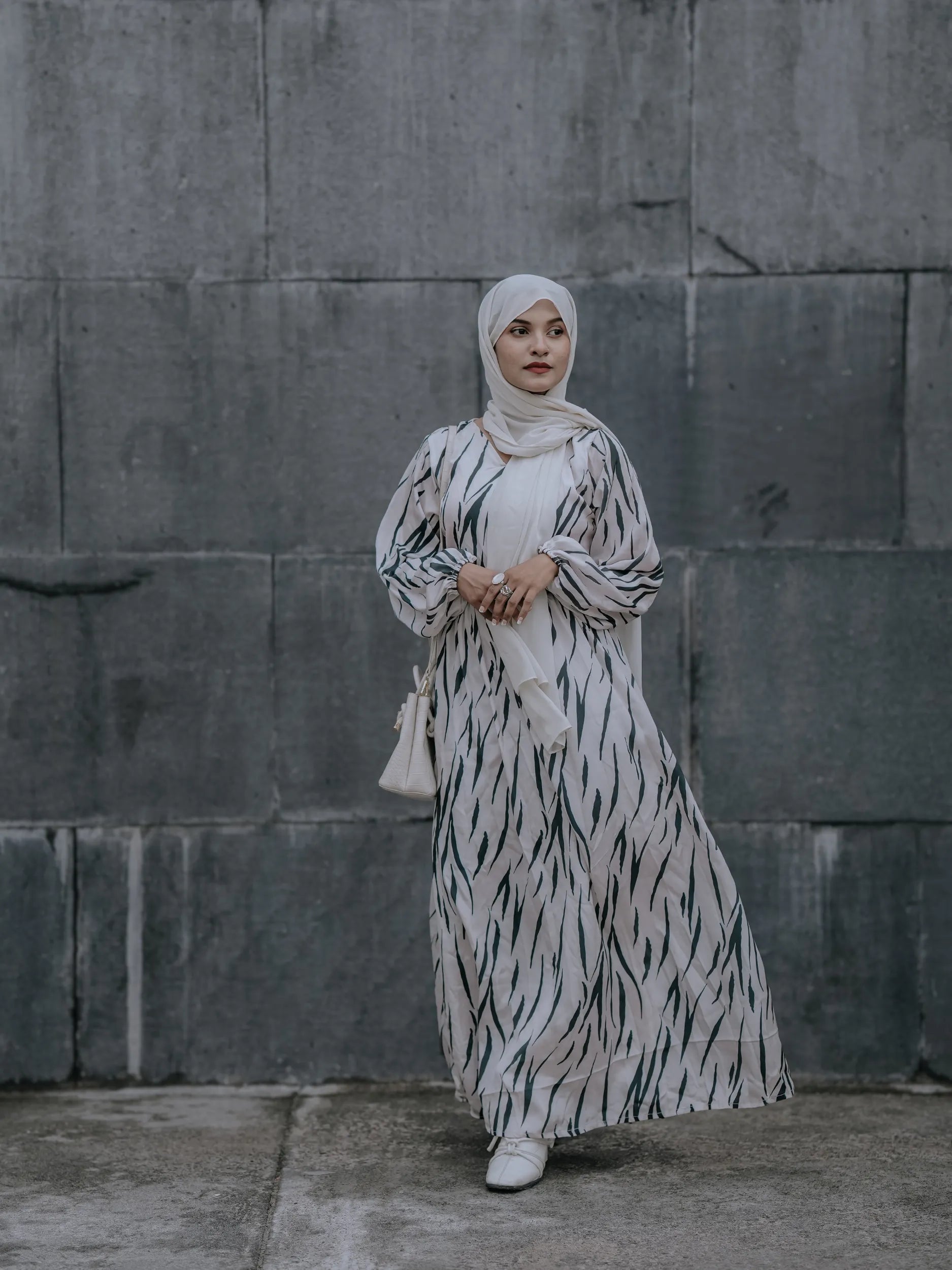 Yezwe V-neck modest dress in stylish print with flowing fabric, perfect for any occasion