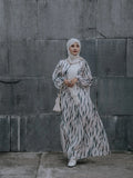 Yezwe V-neck modest dress in stylish print with flowing fabric, perfect for any occasion