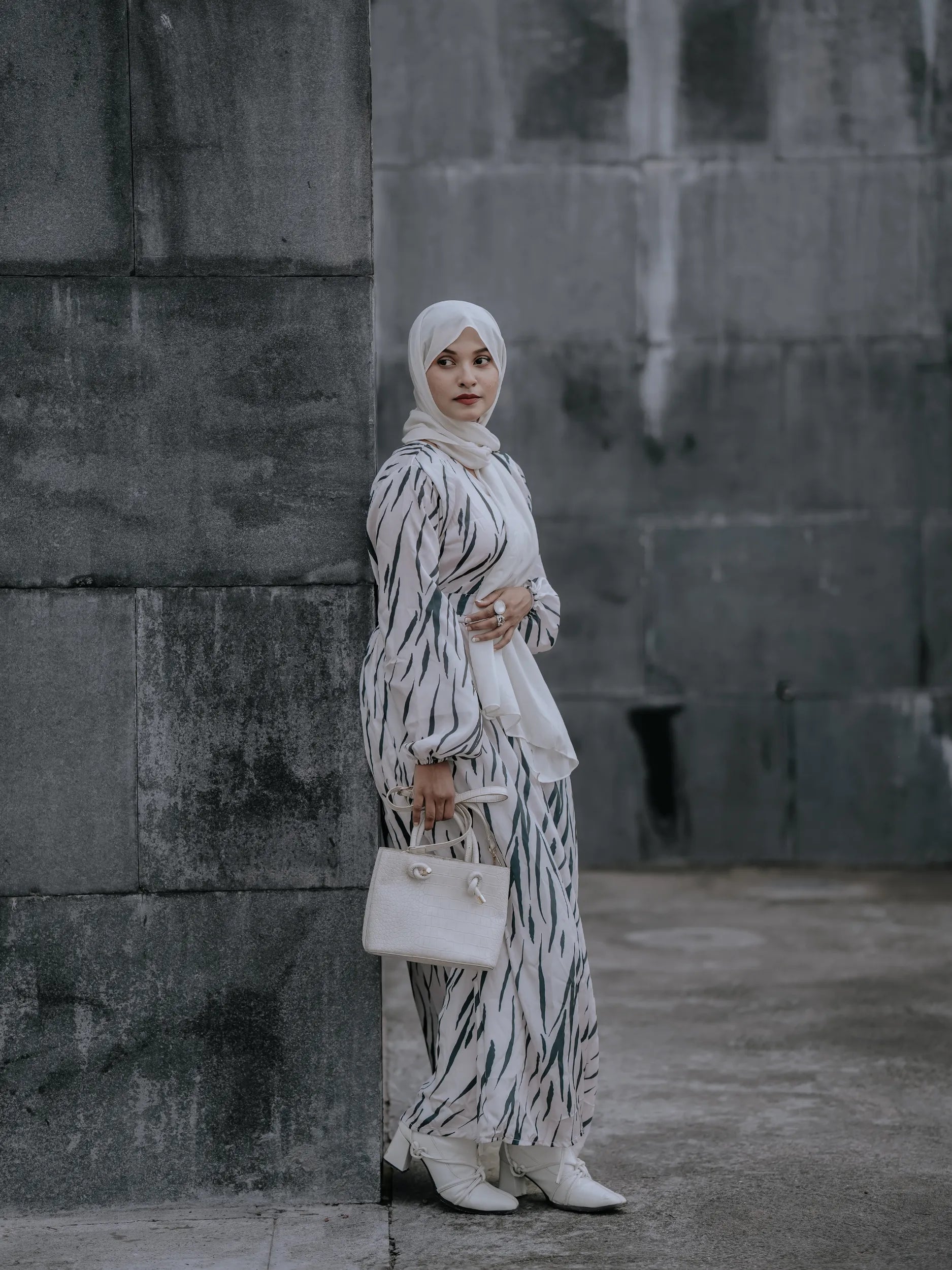 Yezwe v-neck modest dress featuring a unique abstract print and elegant long sleeves