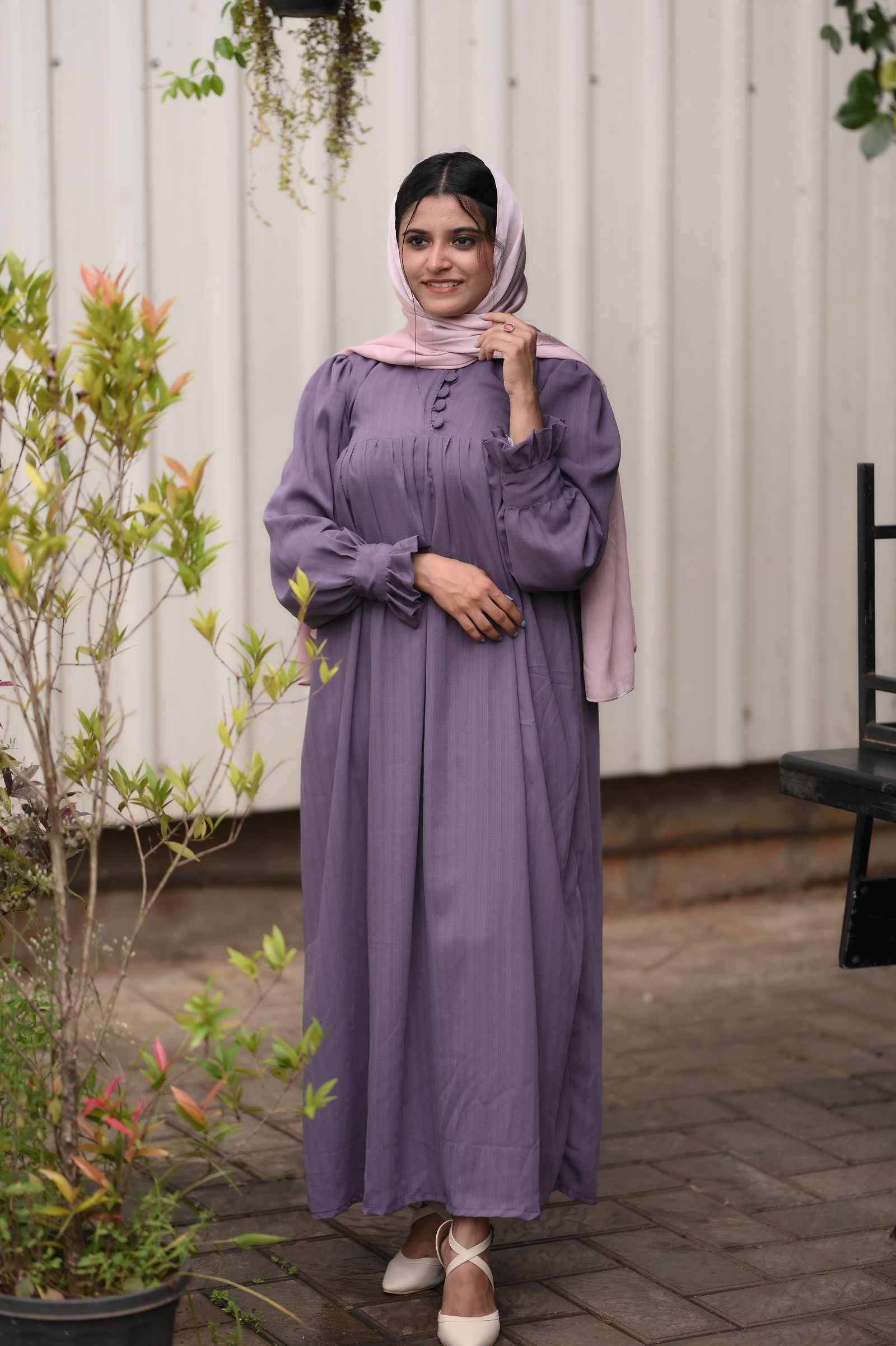 Modest grape purple maxi dress from Yezwe with long sleeves and button detailing