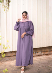 Elegant modest grape purple maxi dress by Yezwe with button details and puff sleeves
