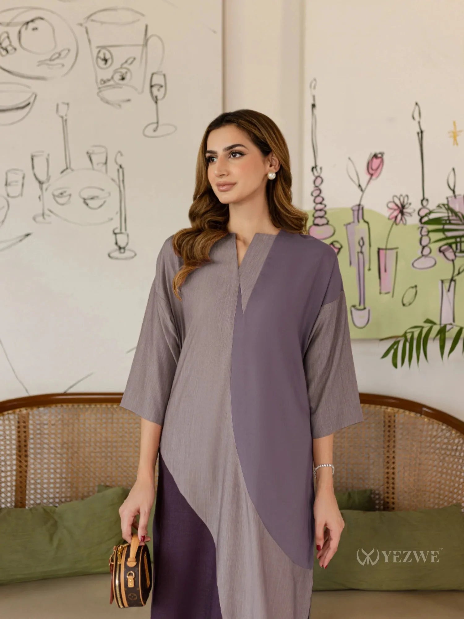 Woman wearing a stylish purple and gray YEZWE Co-Ord Set with a loose fit and long sleeves