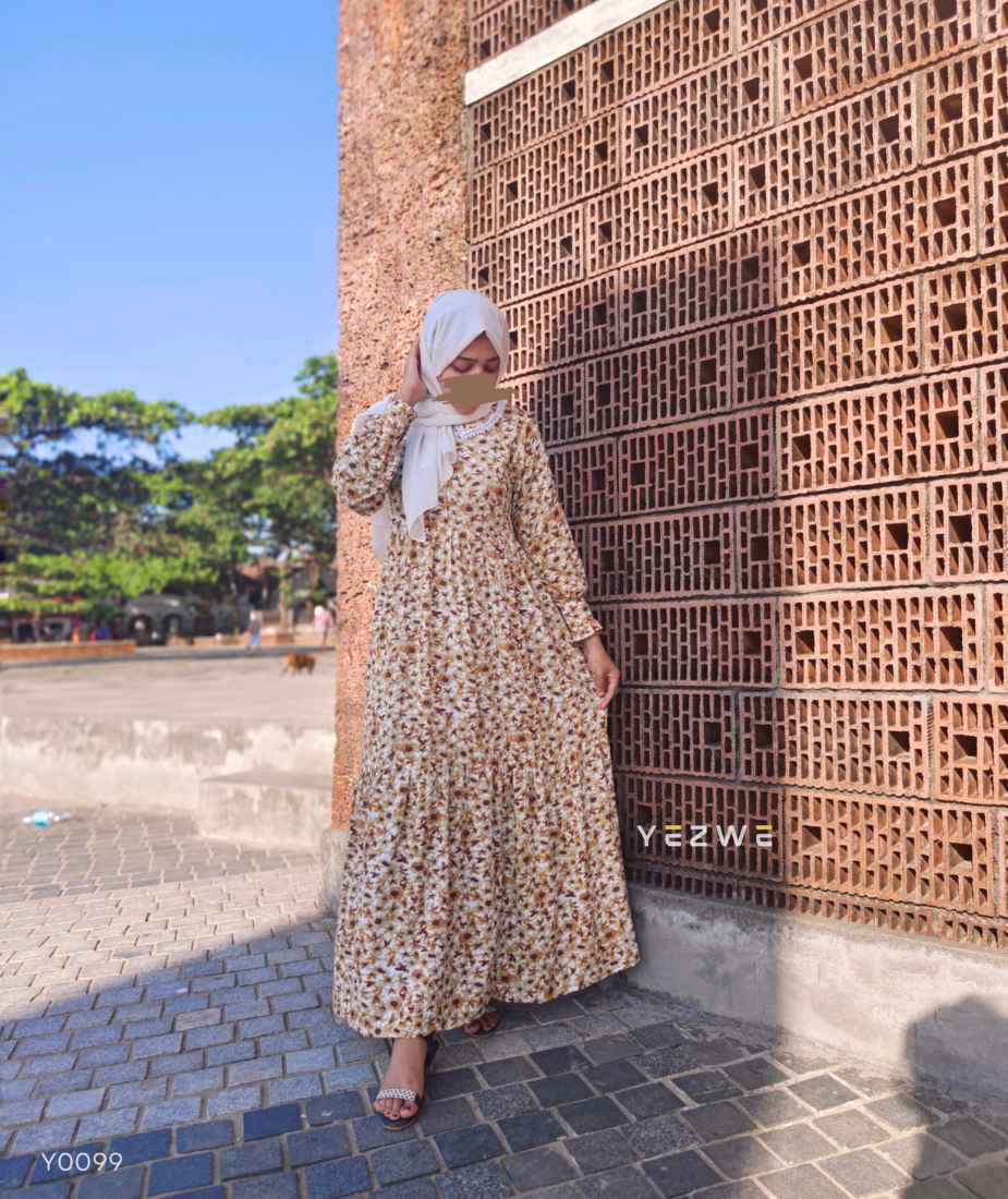 Yezwe Yellow maxi dress modest wear featuring a floral pattern and tiered design for elegant style