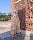 Yezwe Yellow maxi dress modest wear featuring a floral pattern and tiered design for elegant style