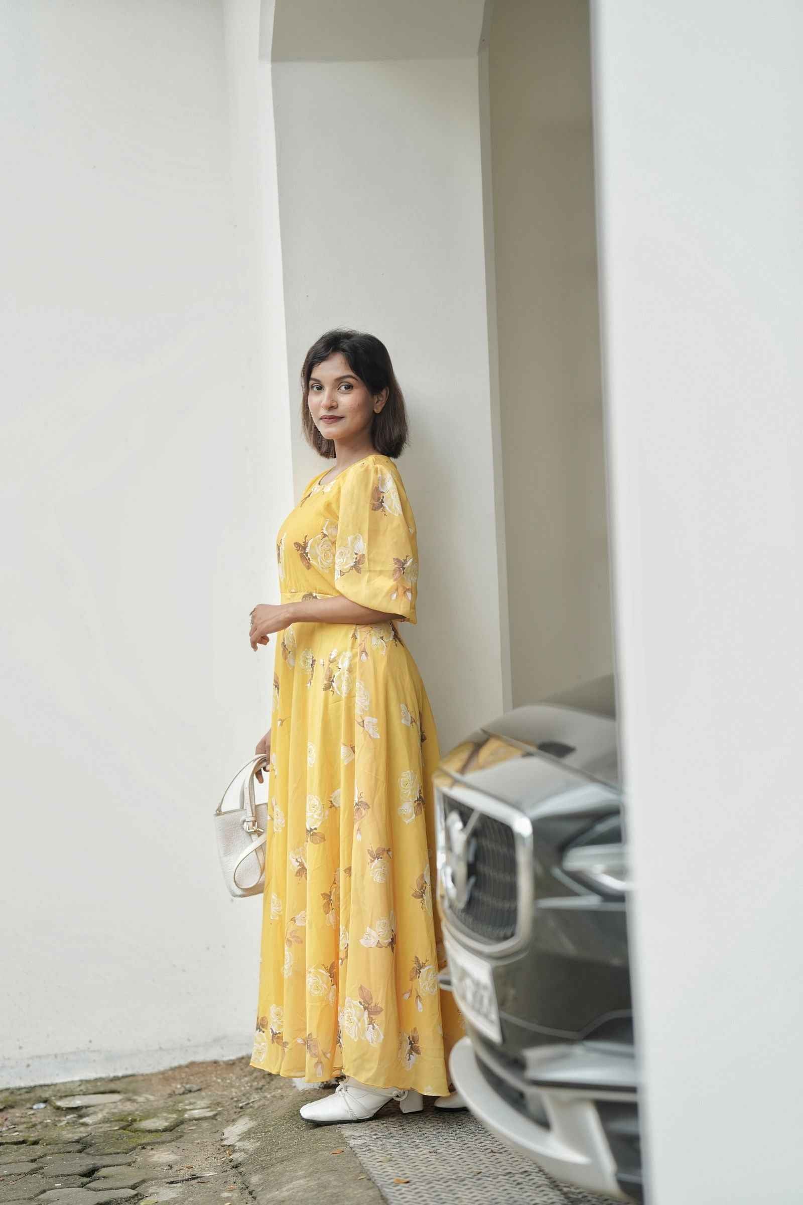 Yezwe yellow puff sleeve maxi dress with floral design, perfect for summer outings and special events