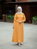 Modest orange co-ord set from Yezwe featuring a long top and matching skirt for elegant style