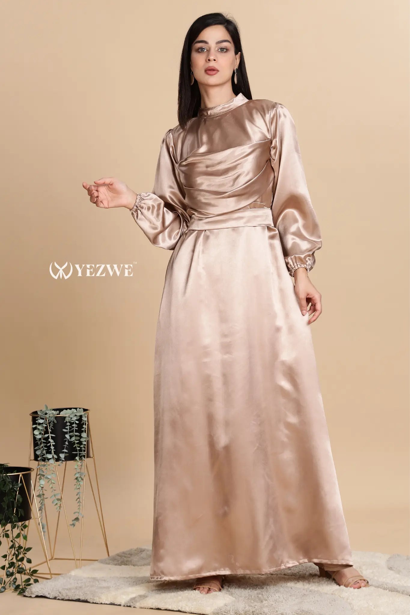 Elegant Golden Satin Maxi Dress by YEZWE featuring long sleeves and a flowing silhouette