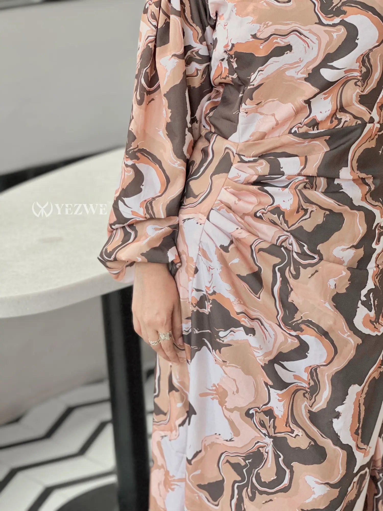 Yezwe modest mocha swirl maxi dress featuring a unique abstract pattern and long sleeves