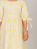 close shot of sleeve tye and embridery in Miniature Yellow Love Embroidered Kora Modest Maxi Dress For Junior Girls