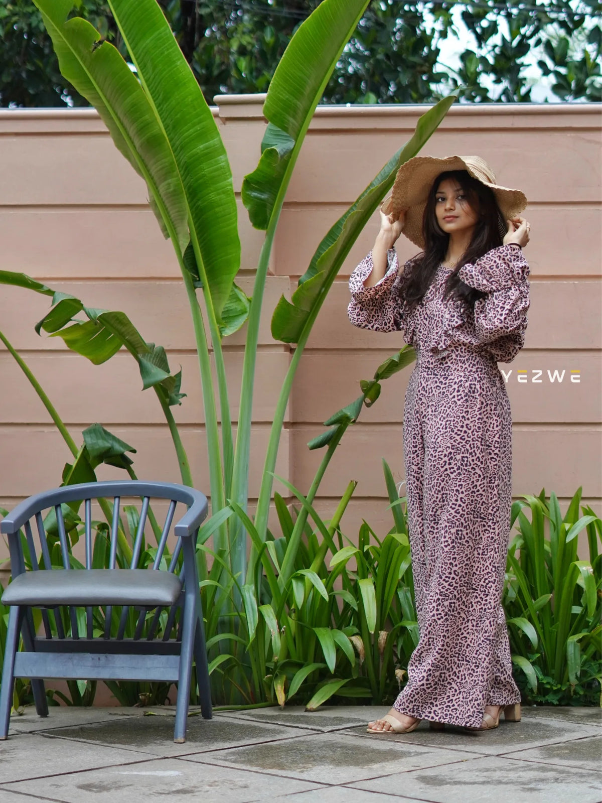 Yezwe belted front open jumpsuit in a chic leopard print design, perfect for summer outings