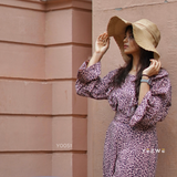 Yezwe belted jumpsuit clearance sale featuring a stylish design and flowy sleeves in a trendy print