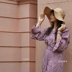 Yezwe belted jumpsuit clearance sale featuring a stylish design and flowy sleeves in a trendy print