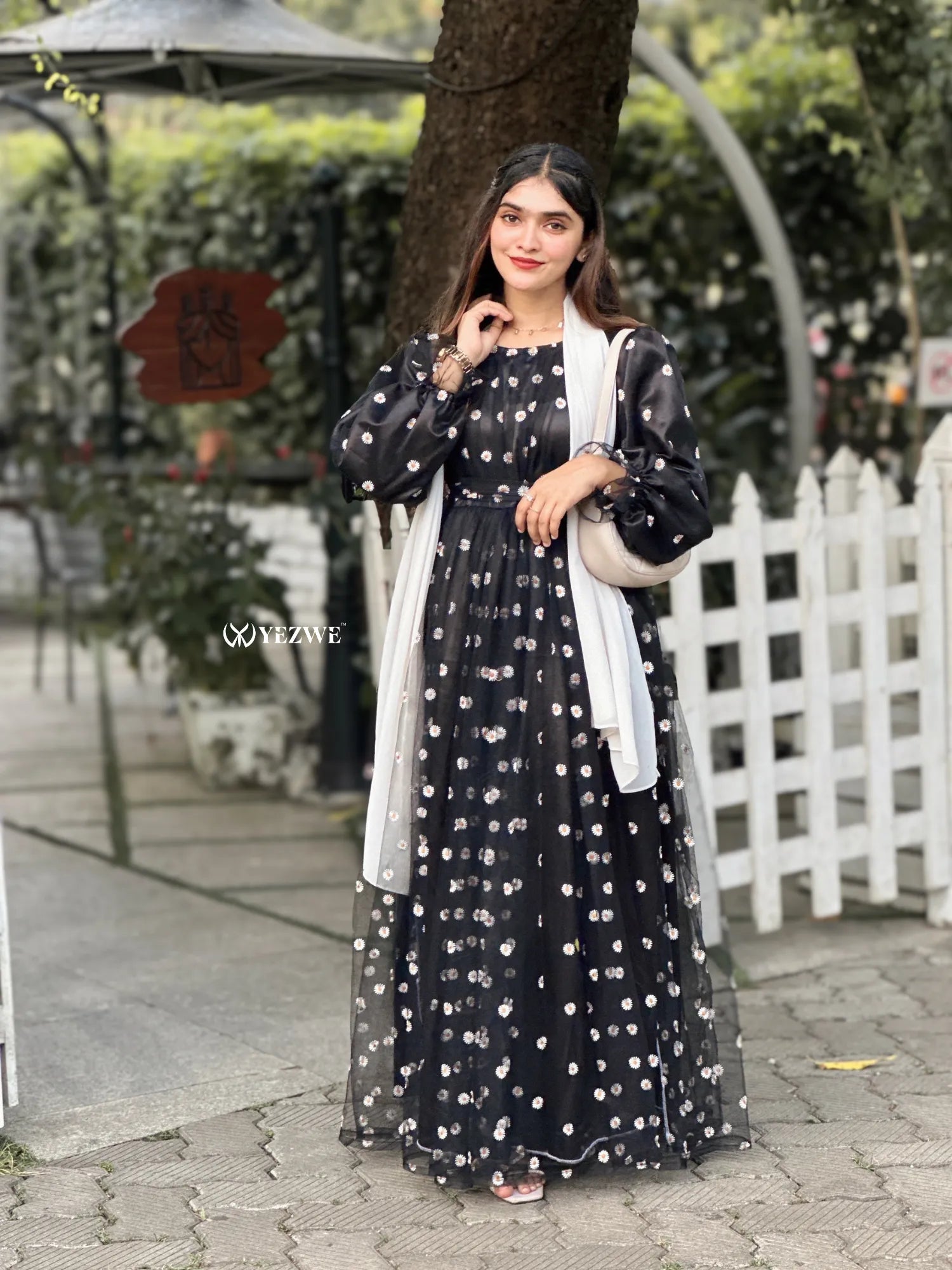 Yezwe black floral embroidery gown with long sleeves and a flowing silhouette for elegant occasions