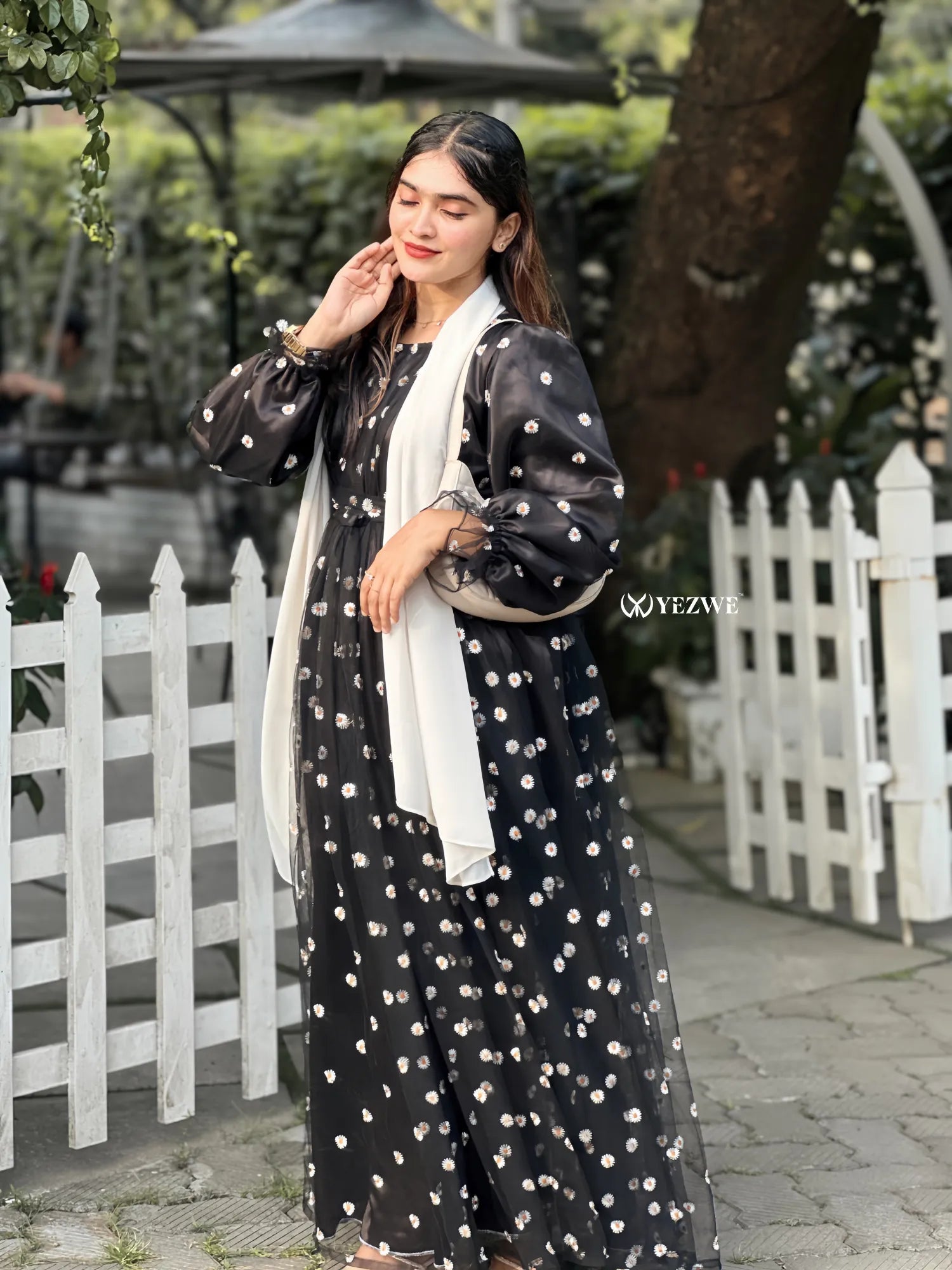 Yezwe black floral embroidery gown with long sleeves and a flowing silhouette, perfect for casual occasions