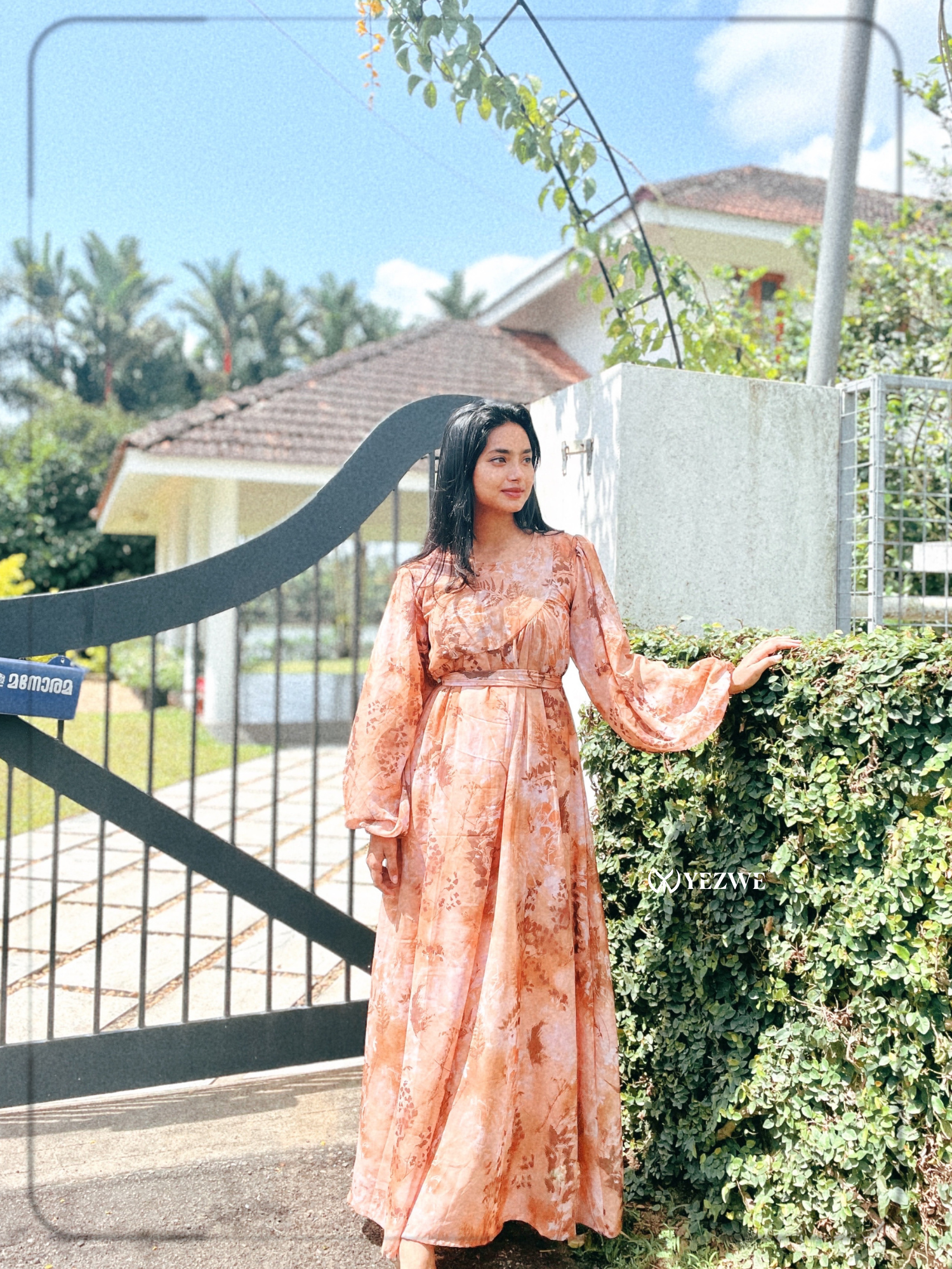 Yezwe brown floral georgette maxi dress with long sleeves, perfect for elegant casual wear
