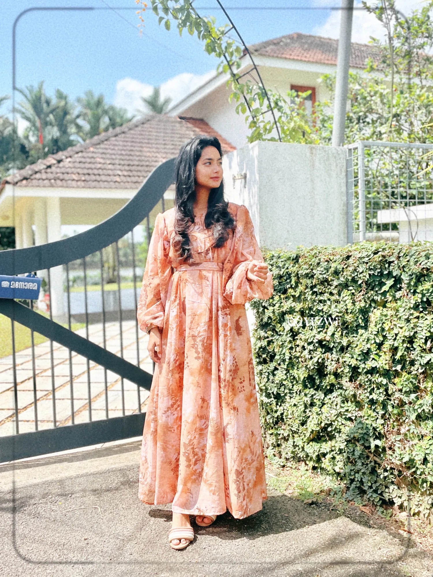 Elegant brown floral georgette maxi dress with long sleeves perfect for casual outings