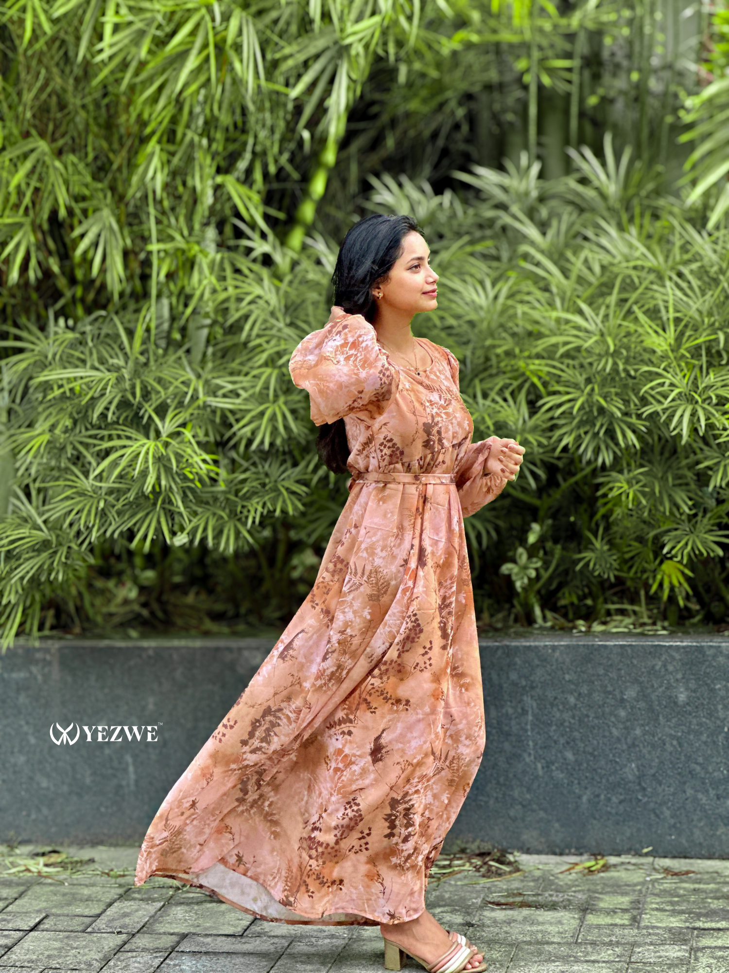 Yezwe brown floral georgette maxi dress with long sleeves and flowing design, perfect for warm weather occasions