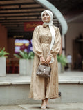 Yezwe brown textured maxi dress with button details and long sleeves, styled with a handbag