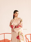 YEZWE Co-Ord Set featuring a beige dress with vibrant red and pink floral embroidery on sleeves and side