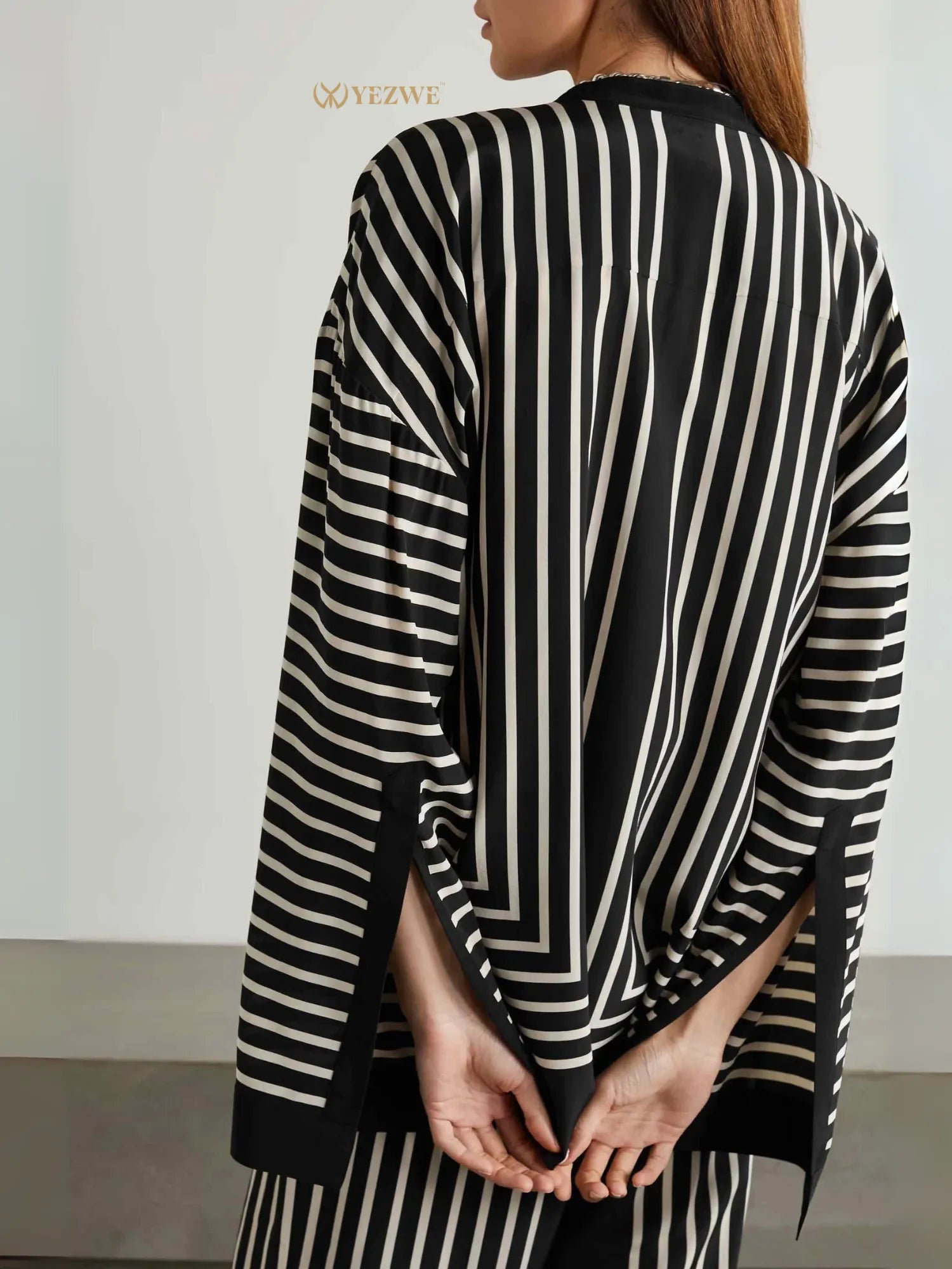 YEZWE black and white striped Co-Ord Set with long sleeves and relaxed fit shown from back