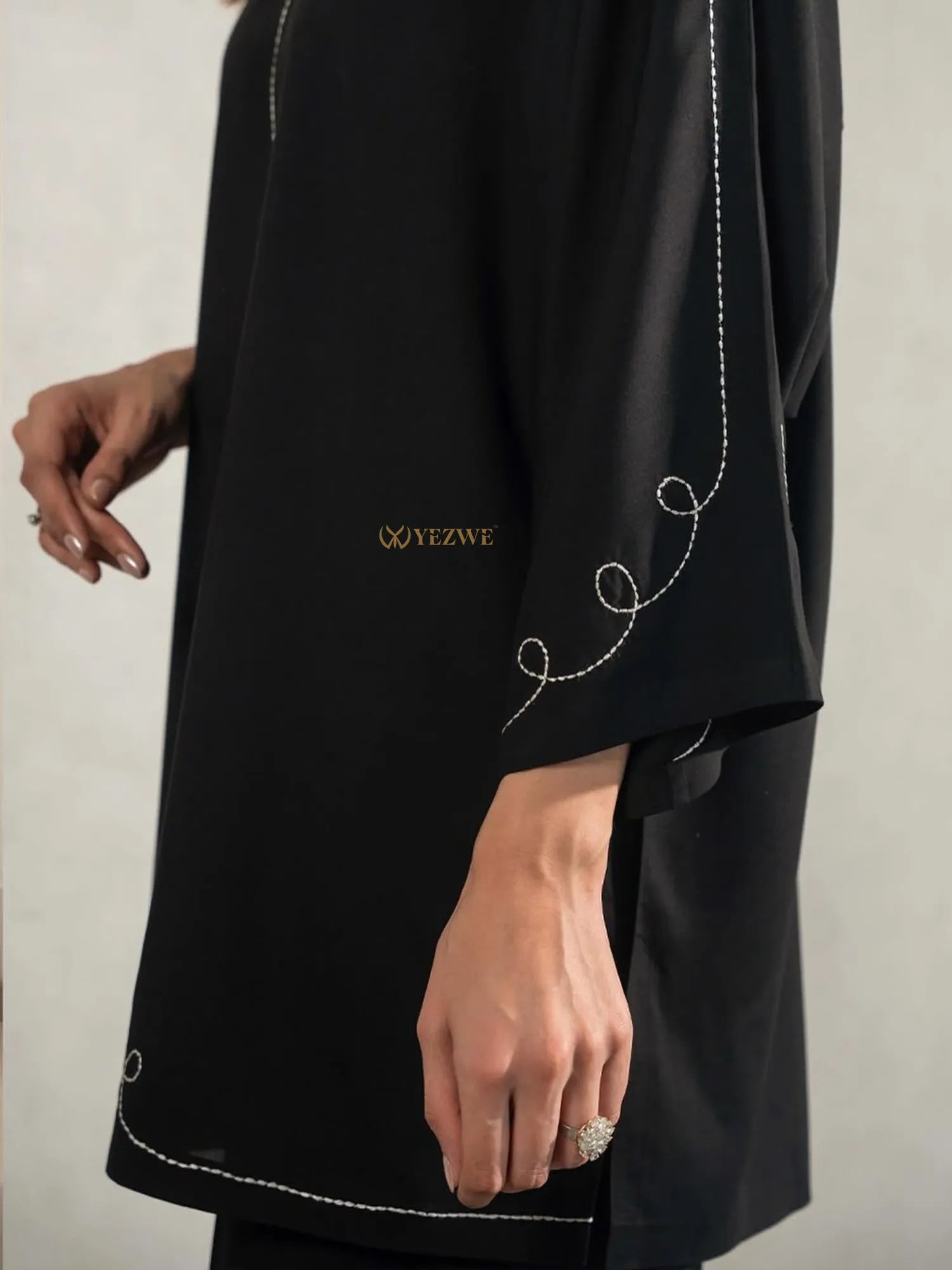 Yezwe black tunic with bottom Co-Ord Set featuring white stitched detailing on sleeves and hem