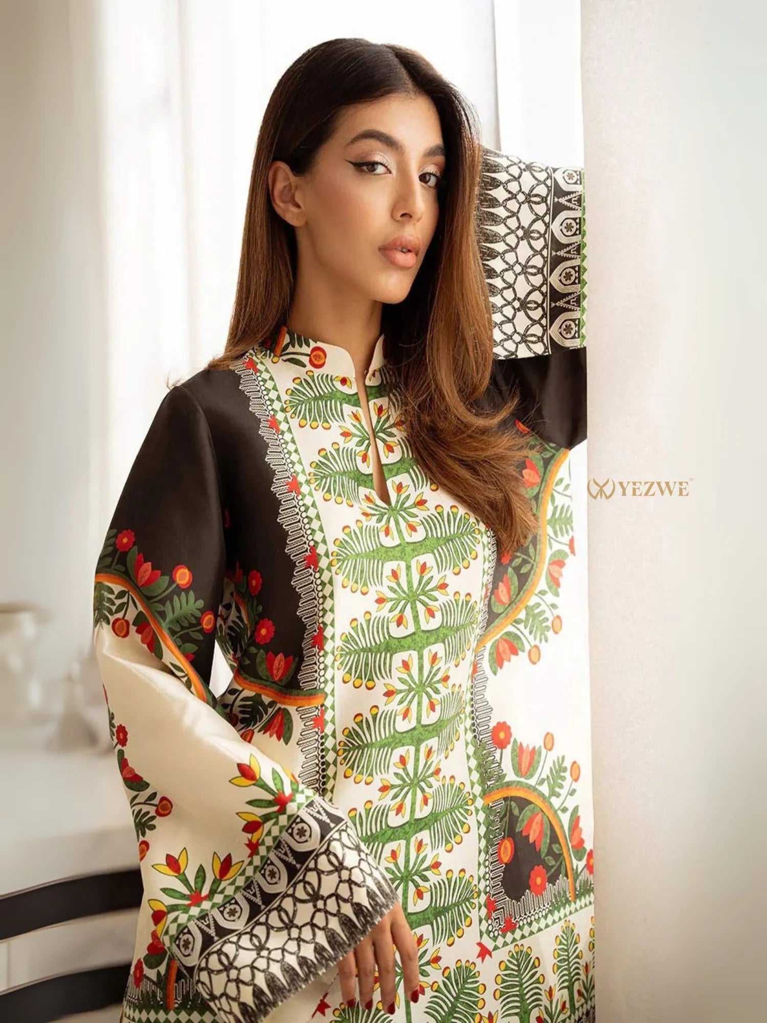 Yezwe Co-Ord Set tunic with bottom featuring green floral and geometric prints on cream and black fabric