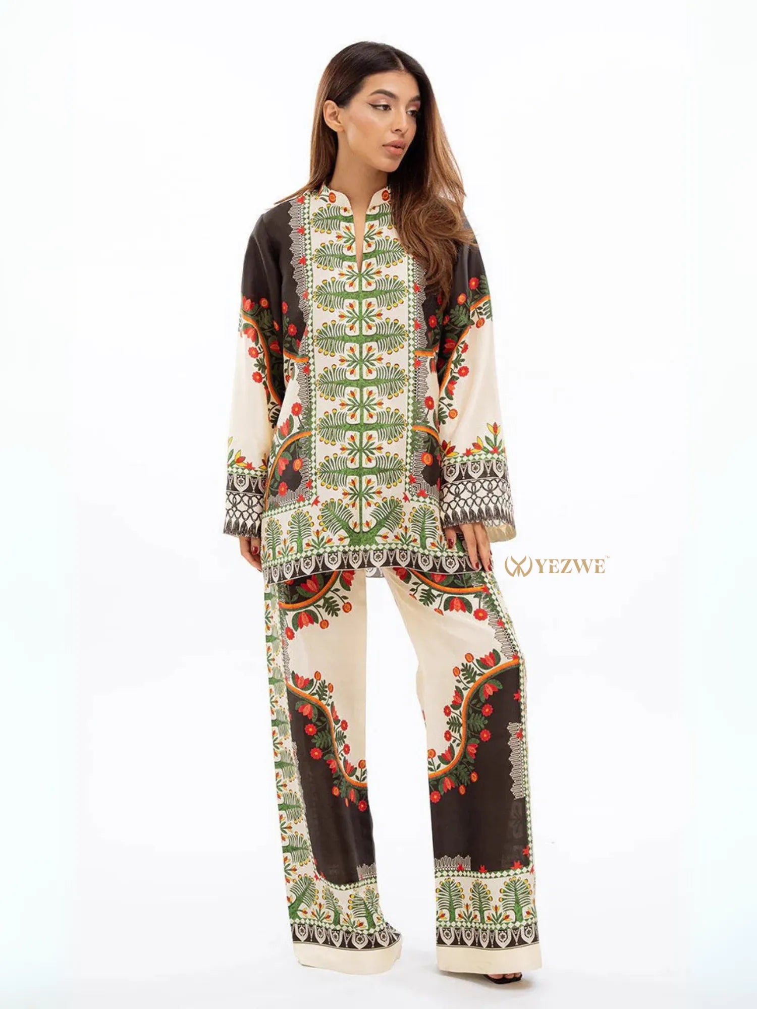 Yezwe Co-Ord Set tunic with bottom featuring intricate green and red floral patterns on cream and black fabric