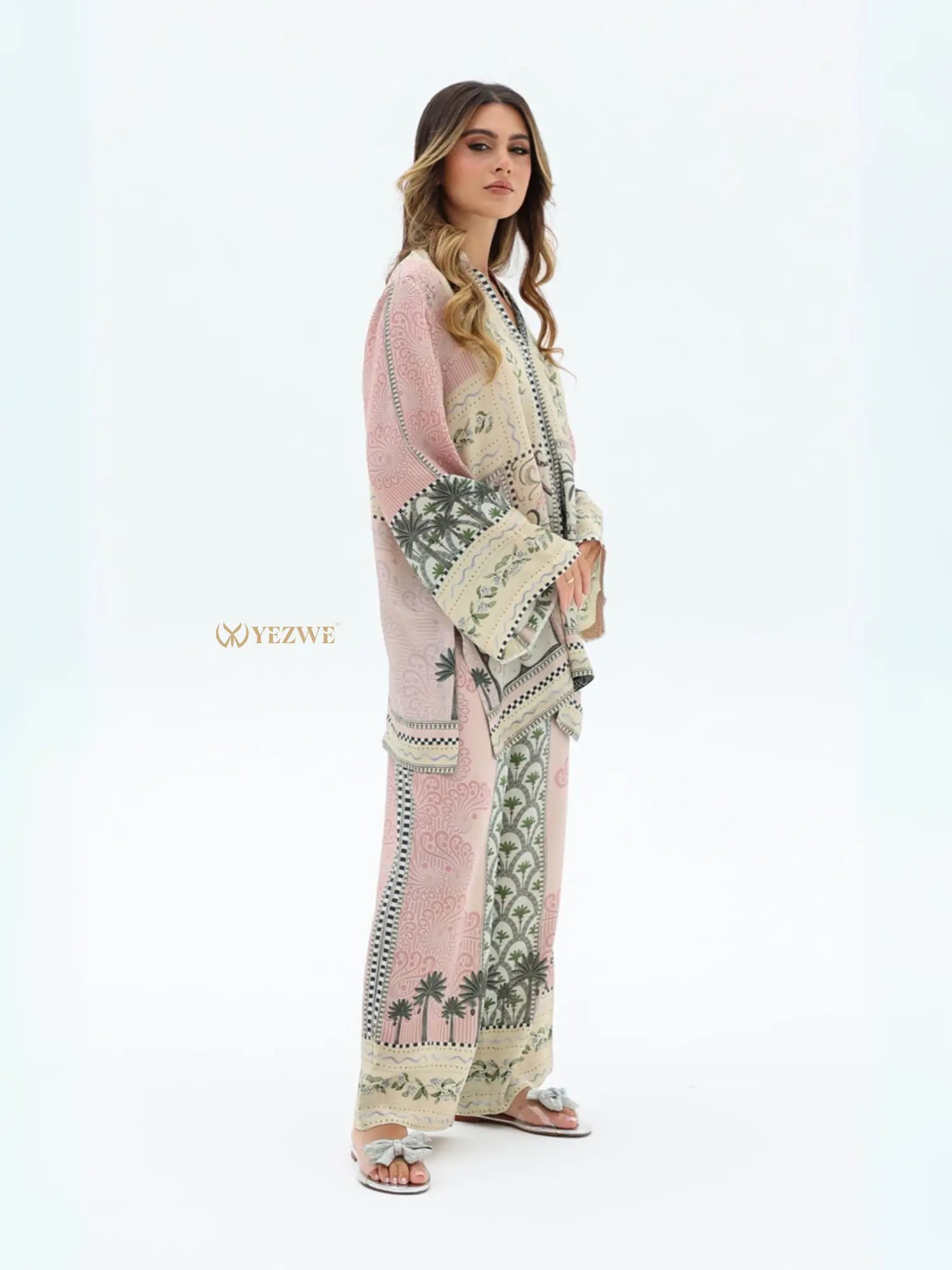 YEZWE Co-Ord Set featuring a loose pink and cream top and wide-leg pants with botanical prints