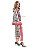YEZWE black and pink patterned Co-Ord Set featuring long sleeves and tapered pants worn with black heels