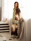 Yezwe Co-Ord Set tunic with bottom in cream, black, and green floral print, worn by woman indoors