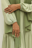 Yezwe custom modest dresses India featuring a soft green maxi dress with balloon sleeves and layered design