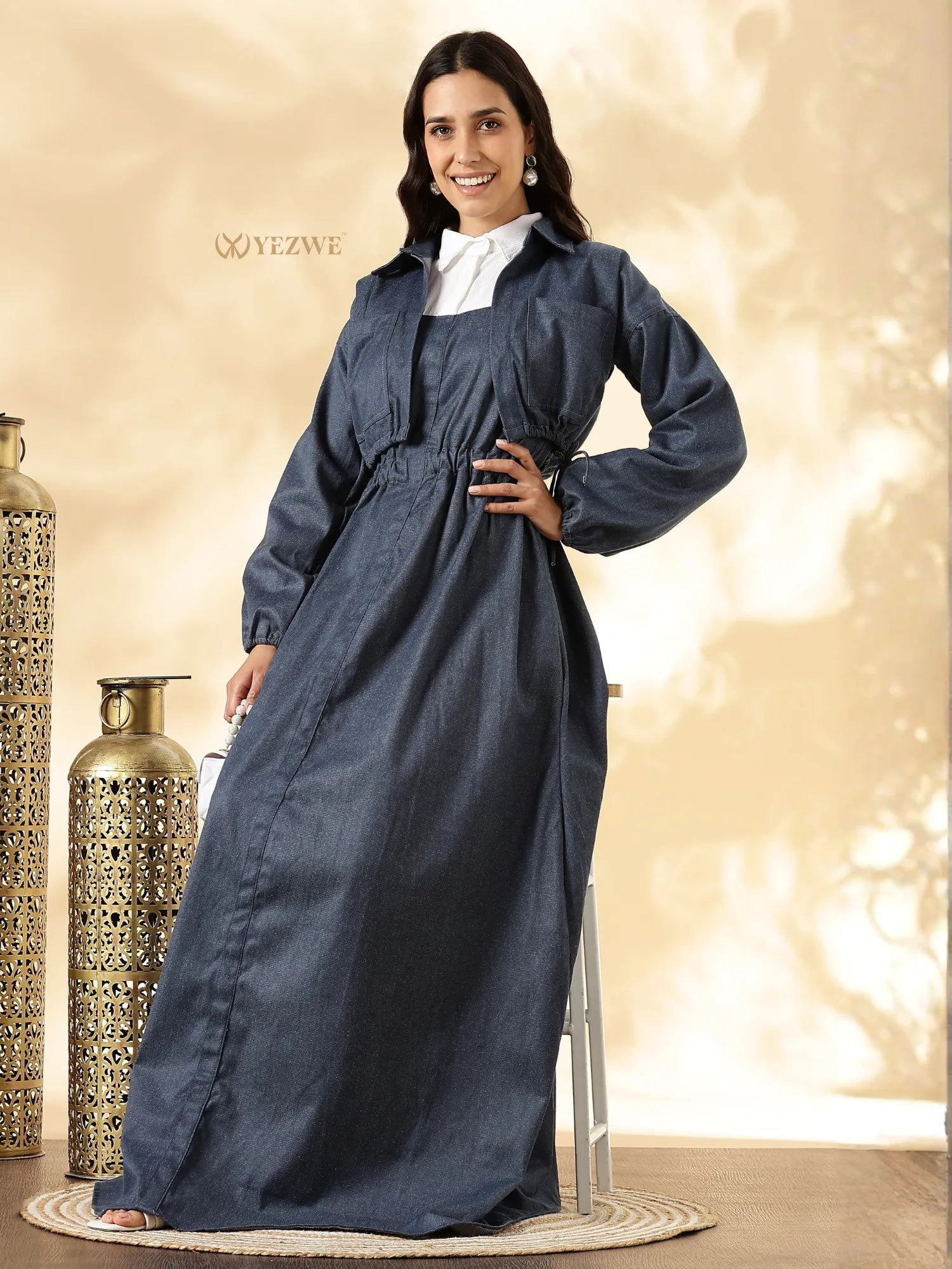 YEZWE denim maxi gown with shrug featuring long sleeves and a cinched waist for a stylish look