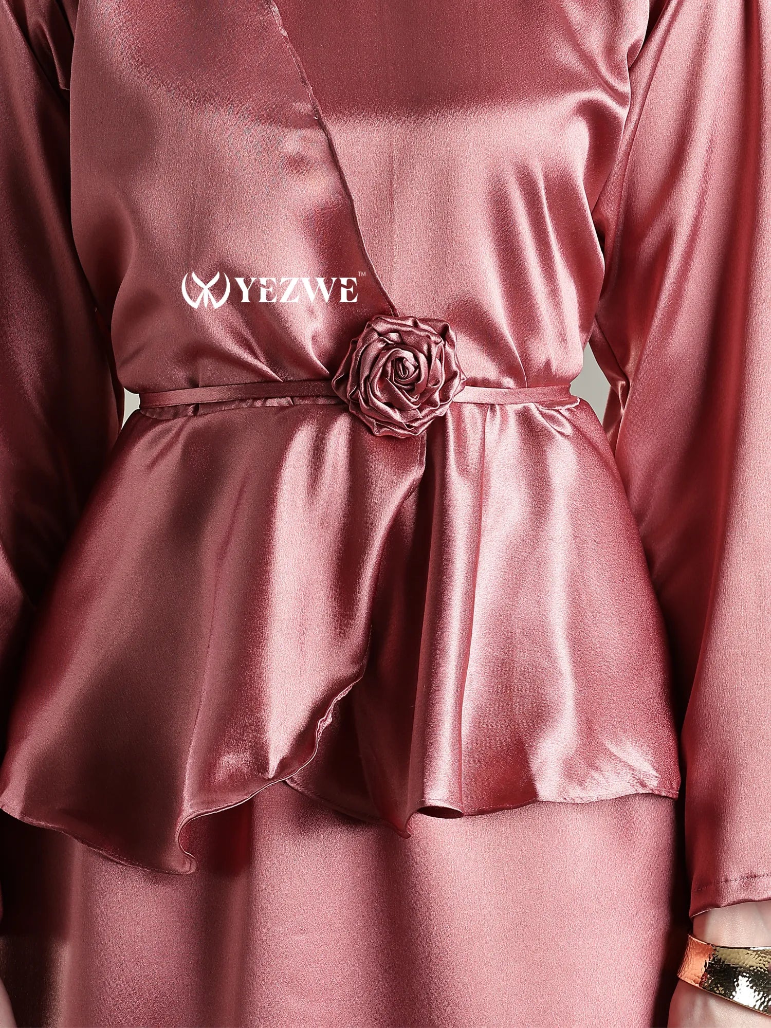 YEZWE dusty pink satin modest co-ord set featuring a stylish belted design with floral embellishment