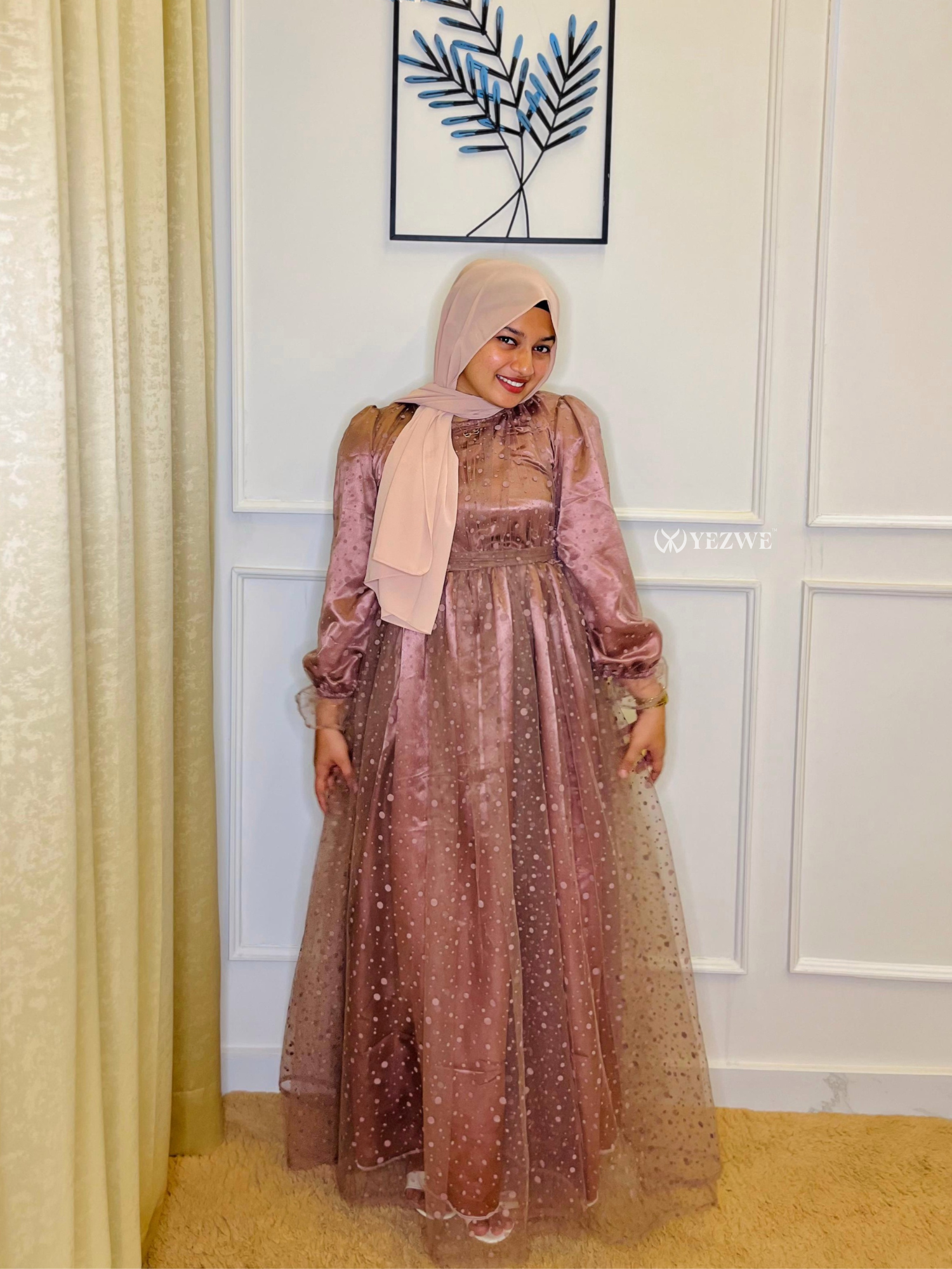 Yezwe dusty rose modest gown featuring a tulle overlay and long sleeves for elegant occasions