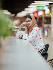 Yezwe embroidered kora fabric dress in white with red heart patterns, perfect for casual outings