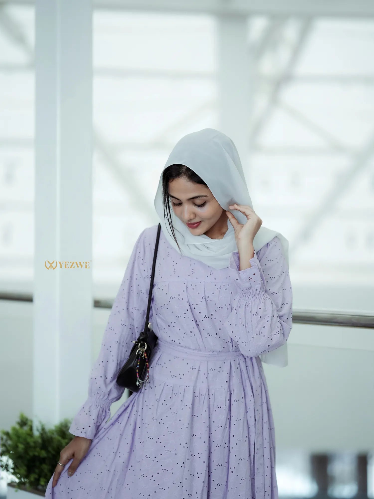 Yezwe embroidery hakoba light dress in lavender with long sleeves and elegant design