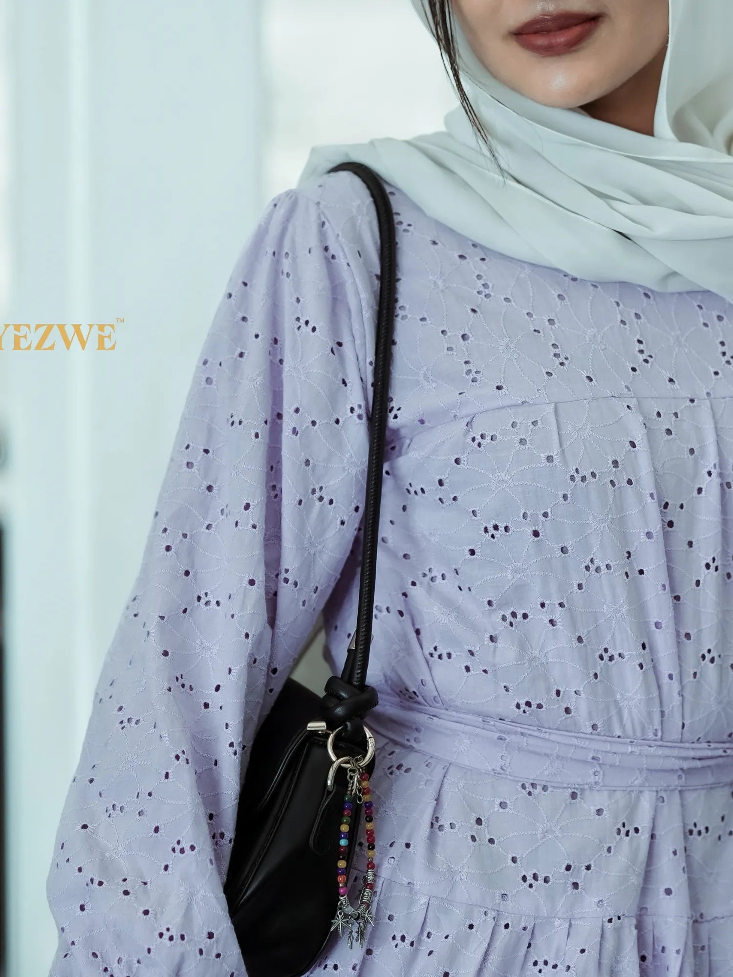 Yezwe embroidery hakoba light dress in lavender with elegant details and long sleeves