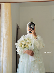 Yezwe floral embroidery gown with delicate design, perfect for special occasions and events
