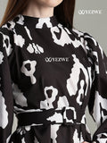 YEZWE Full Length black modest maxi Dress with unique abstract patterns and a stylish belt detail