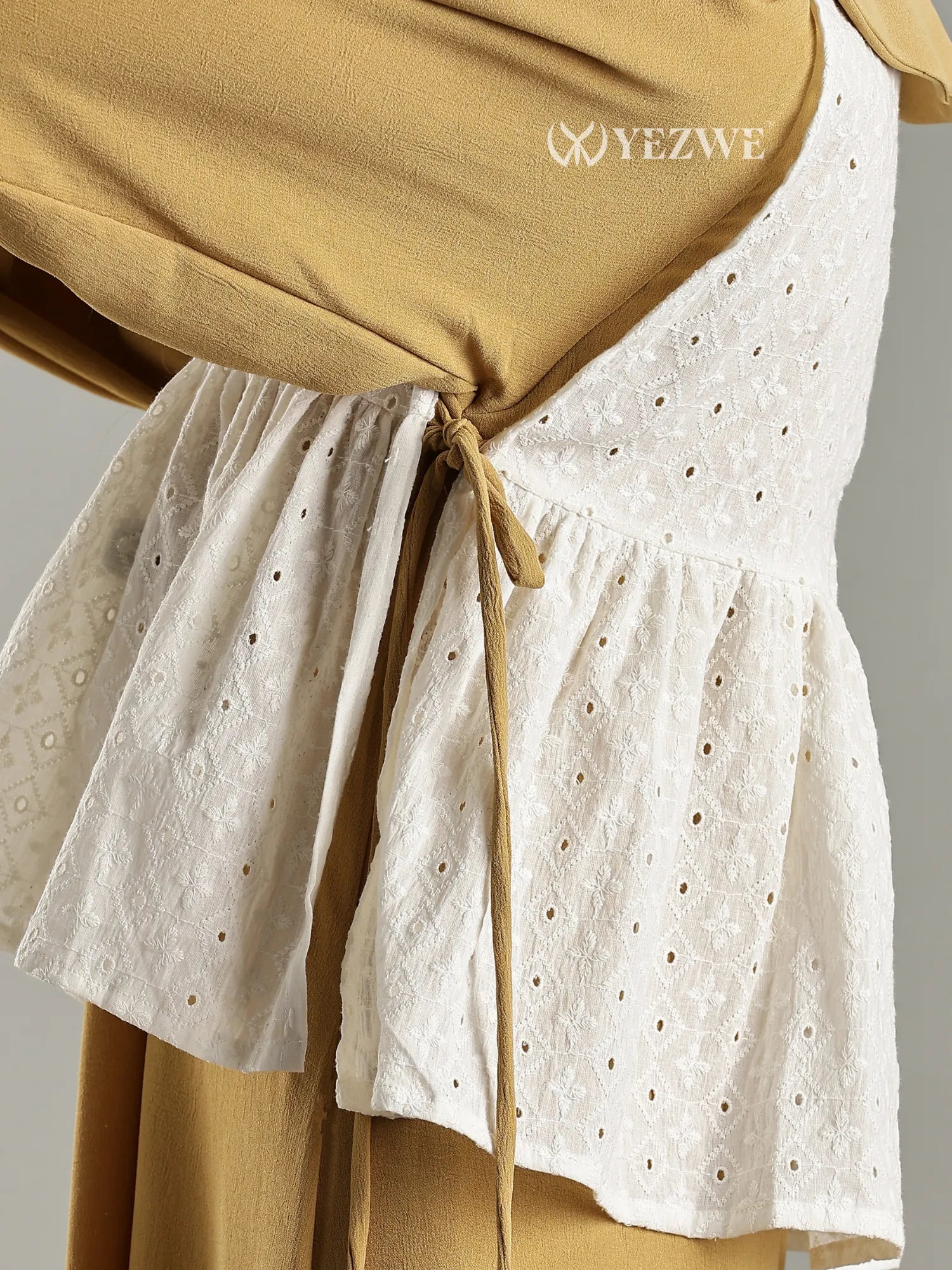 Golden Modest Maxi Dress with Hakoba Shrug featuring white eyelet detail and tie closure by YEZWE