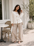 YEZWE Ivory Bow Cey Top And Plaid Modest Co-Ord Set For Women with wide leg pants and button details