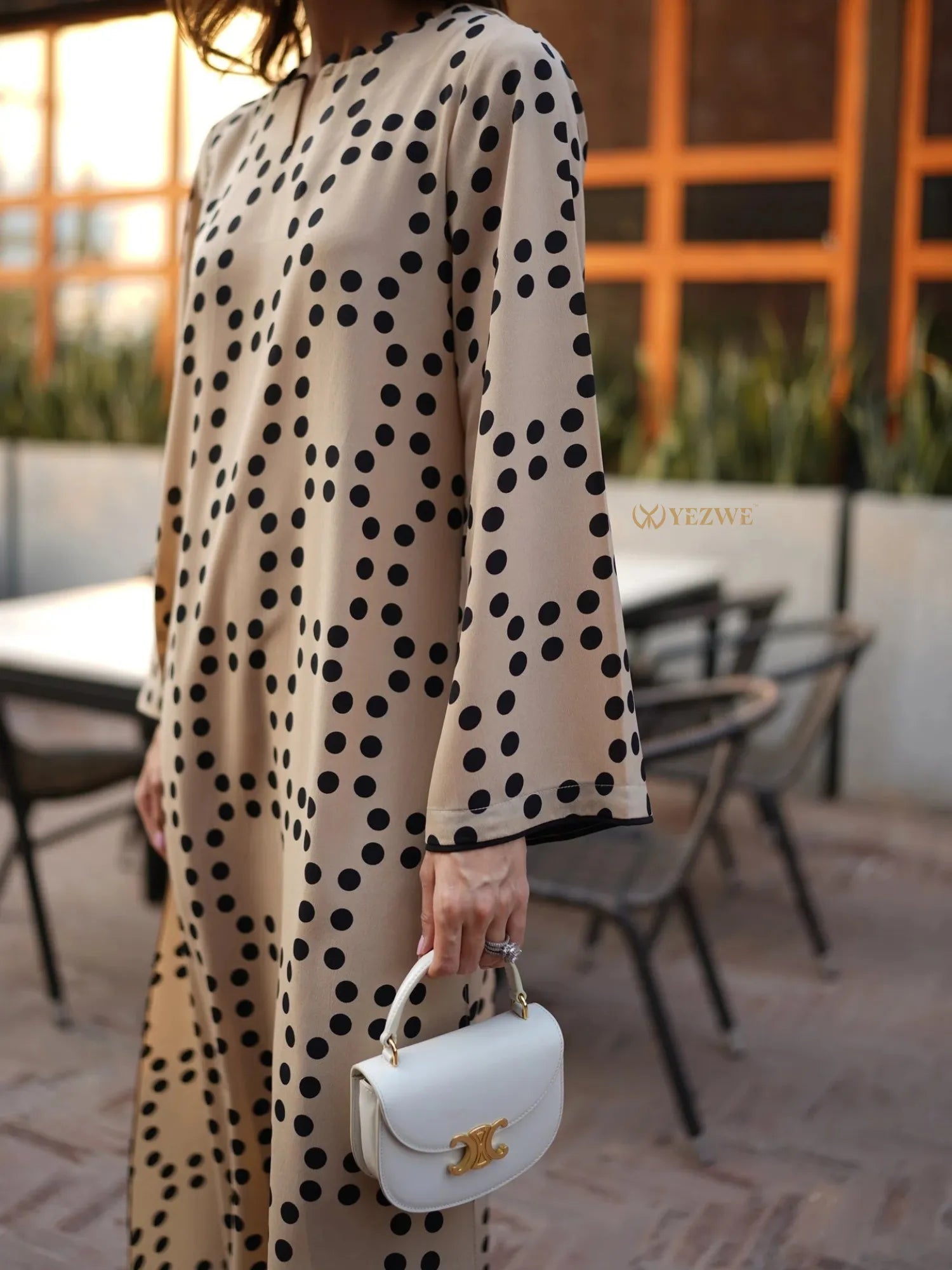 YEZWE co-ord set featuring a beige long tunic with black polka dots paired with matching pant
