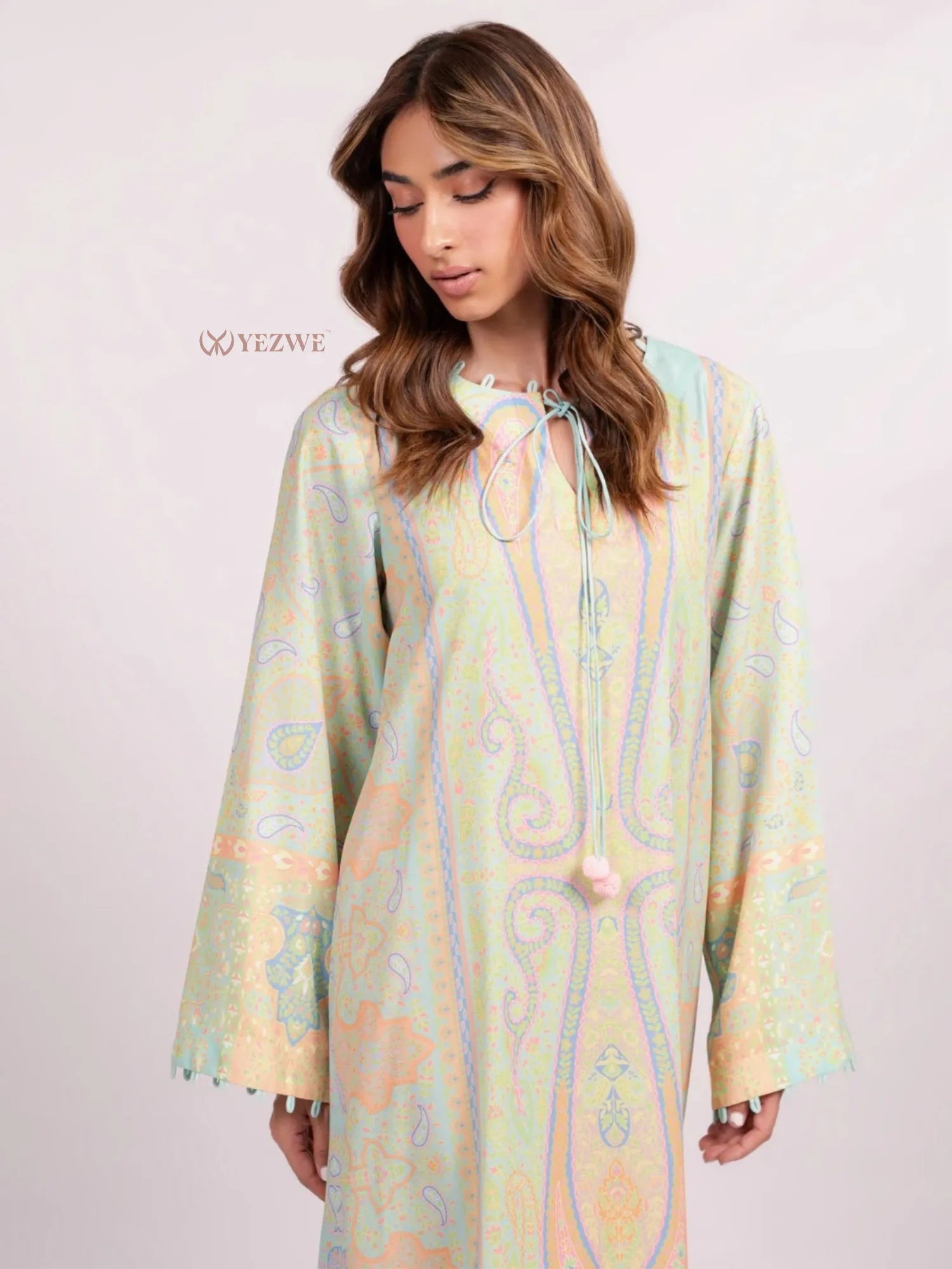 YEZWE pastel paisley Maxi Abaya Dress tunic with tie neckline and bell sleeves on model