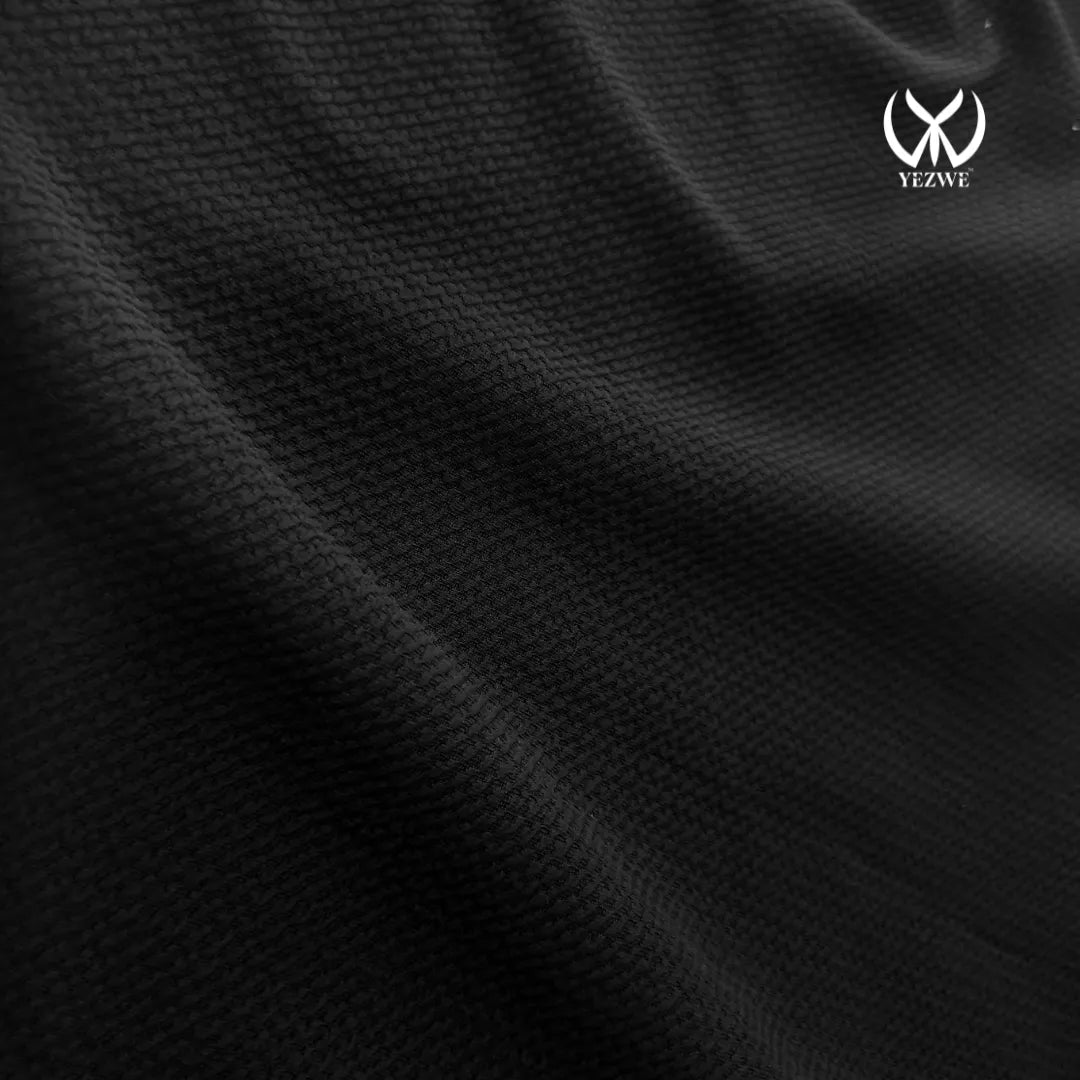 Close-up of Yezwe knitted Modest maxi dress for women showcasing soft textured fabric in black