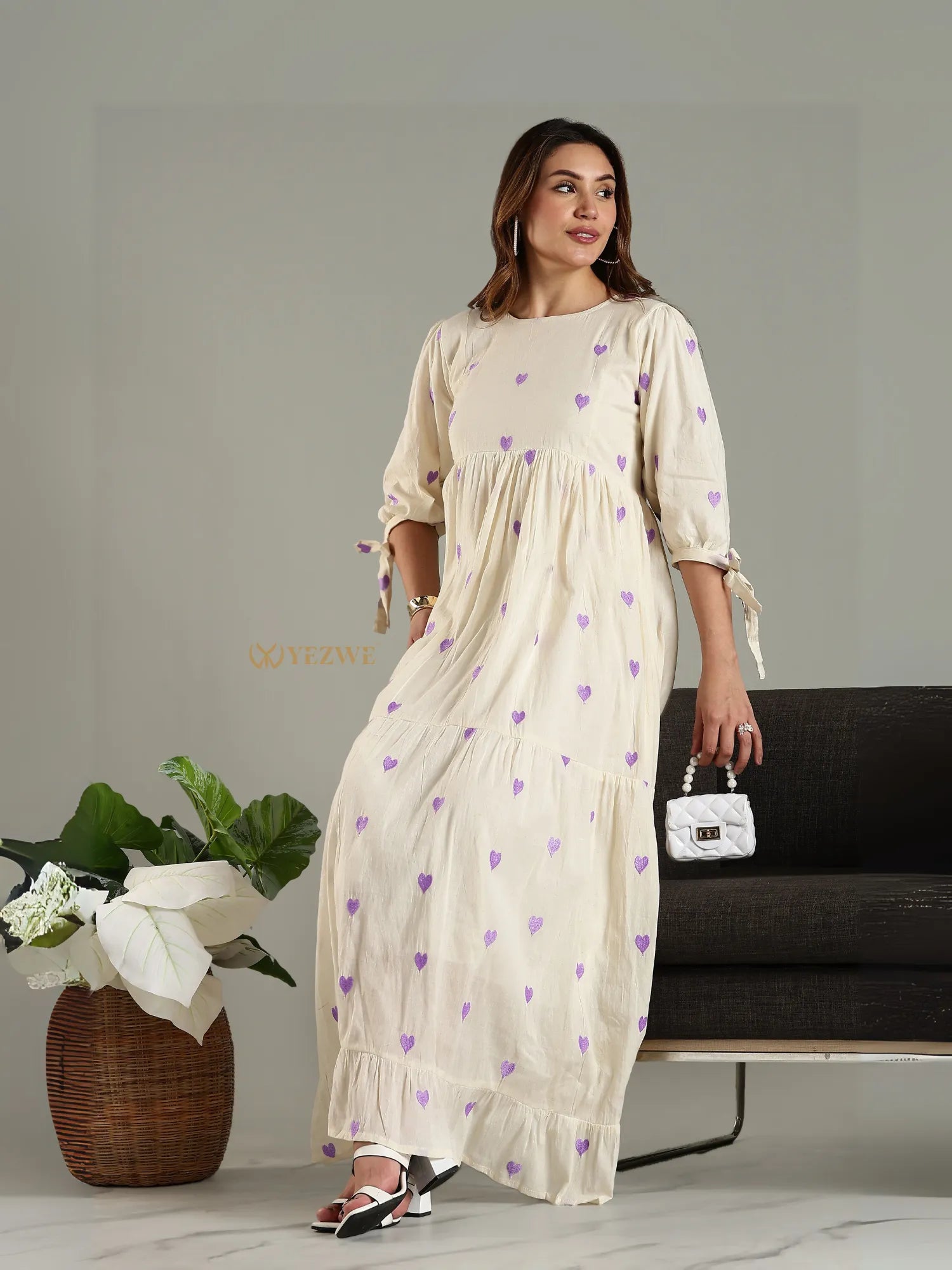 Yezwe cream maxi dress with purple heart patterns and three quarter sleeves with tie details